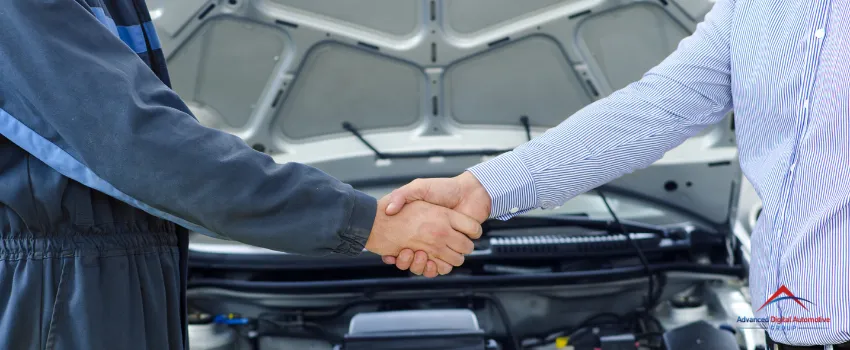 ADAG - Auto Repair Team Member Shaking Hands with a Client
